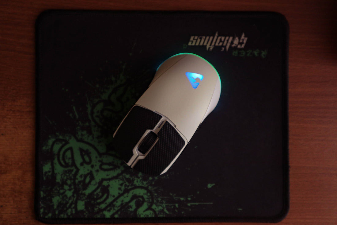 a close up of a mouse on a mouse pad