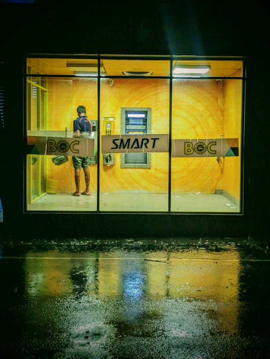 A man standing in front of a smart phone store