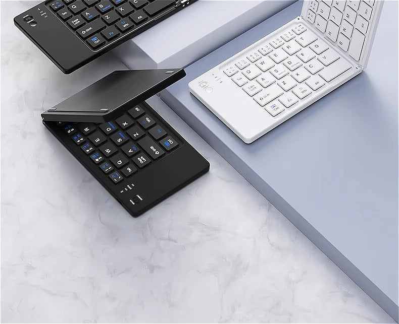 MINGCVIL Mini Foldable Wireless Keyboard - Slim Portable Bluetooth Rechargeable Keyboard for iOS, Windows, Android - TrendBug